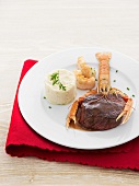 Beef fillet with scampi and parsley root purée