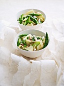 Pasta with asparagus, peas, pine nuts and brousse cheese