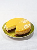 Cheesecake with yuzu, with a slice removed