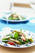 Green bean salad with strawberries and breaded chicken