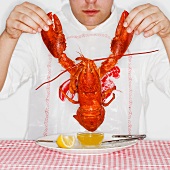 Man dining with an entire lobster