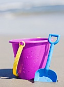Bucket and shovel on beach