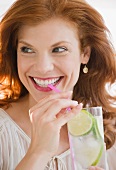 Woman drinking lime water