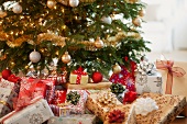 Colorful gifts under christmas tree