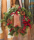 Couple holding christmas wreath