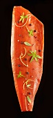 Smoked side of salmon with herbs and spices