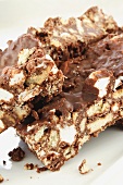 Several pieces of rocky road cake