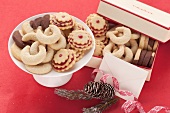 Assorted Christmas biscuits on plate and in box