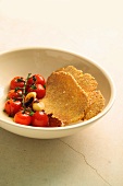Roasted tomatoes and toasted semolina flat bread