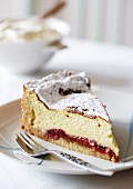 A slice of strawberry and rhubarb cheesecake