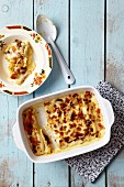 Cannelloni filled with squash, lentils and ricotta, topped with cheese sauce and baked