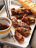 Barbecued chicken wings with barbecue sauce