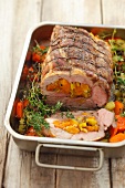 Pork neck stuffed with dried apricots and leeks
