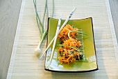 Carrot salad with ginger, spring onions and black sesame