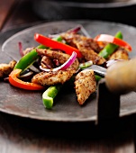 Sauteed chicken with peppers and onions
