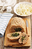 Pork meatloaf with a spinach and feta cheese filling