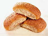 Three oval bread rolls