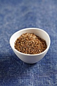 A small bowl of cumin seeds