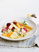 Carpaccio of root vegetables with trout fillet