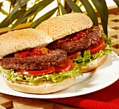 Hamburgers with tomatoes and lettuce