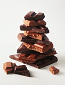 A stack of assorted chunks of chocolate