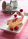 Two slices of yoghurt and raspberry layer cake