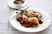 Chicken in red wine sauce with mushrooms