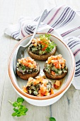 Prince mushrooms stuffed with mashed potato and tomatoes