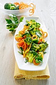 Pan-fried broccoli with carrot spaghetti and spinach