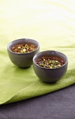 Creamy honey dessert topped with pistachios