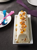 A terrine of nougat ice cream with pieces of nougat