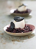 Poached scallops with truffles and black rice