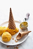 Mango sorbet with ice cream cones