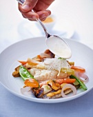 Turbot with vegetables and white sauce