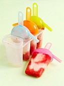 Home-made strawberry frozen yoghurt in ice-lolly moulds