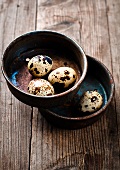 Quail's eggs in ceramic pots