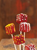 Cake pops decorated to look like wrapped presents