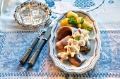 Heringsstipp (marinated, preserved herring dish) with boiled potatoes