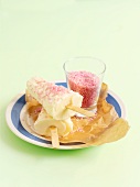 Mango ice cream lollies with pink sugar sprinkles