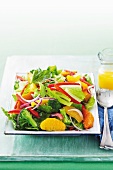Vegetable salad with broccoli, oranges and roasted squash, served with an orange vinaigrette
