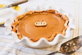 Home-made pumpkin pie in the dish