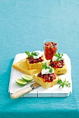 Corn bread topped with chorizo and bean paste