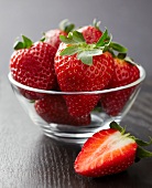 Fresh strawberries in a glass bowl