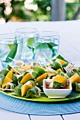 Chicken skewers with mango and mint