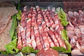 Prosciutto Wrapped Asparagus in a Display Case at a Market in Palermo, Sicily