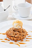 Apple Crumb Tartlet with a Scoop of Vanilla Ice Cream and Caramel Sauce