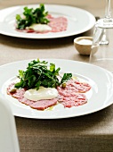 Beef carpaccio with salad leaves