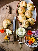 Herb rolls with herb butter and edible flowers