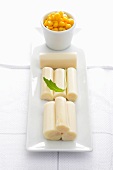 Cylinders of puréed fish with sweetcorn salad