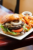 Veggie Burger with Lettuce, Tomato and Onion; Served with Sweet Potato Fries